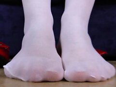 Nurse in white stockings hot foot tease