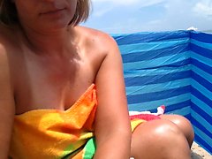 Partner jerks my huge penis in the beach with cumshot that