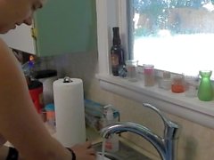Darling Pet Washes Dishes Nude and Begs for Refreshment