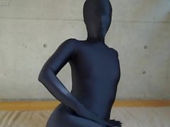 Zentai Mädchen schwing