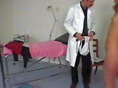 Brunette Muriel is with the doctor who spanks her and checks pussy