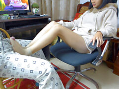 Chinese petite girl in a footjob fetish porn