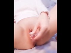 Asian teen with big tits fucks a dildo on webcam