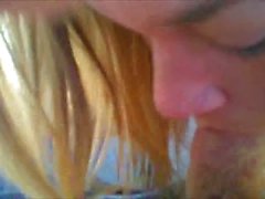 Blonde babe sucking his cock in the back yard