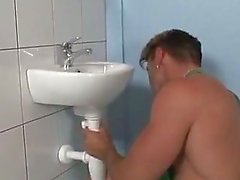 plumber fucks a brunette in toilet