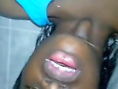 Dark skinned Colombian chick fingers her pink honey hole to